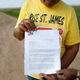 Sharon Lavigne, a member of RISE St. James, holds a letter addressed to the St. James Parish Sheriff, explaining their legal right to access to a burial site on Formosa property in St. James Parish, Louisiana, Wednesday, March 11, 2020. Archaeologists have found that the land bought for a planned $9.4 billion plastics complex may include up to seven slave cemeteries rather than two previously described, local activists said Wednesday.